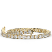 8 Carat Yellow Gold Round Shape Diamond Tennis Bracelet With Prong Setting.
